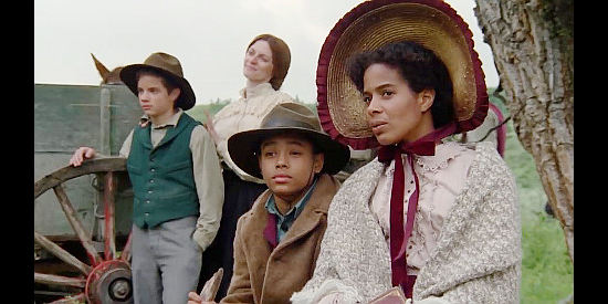 Janet Bailey as Mary Johnson, Britt's wife, with their son Frank (Rainbow Francks) in Black Fox, The Price of Peace (1995)