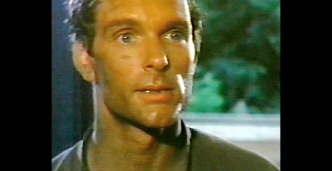 Keir Dullea as Michael Lewis, the newcomer determined to be no man's slave in Welcome to Blood City (1977)