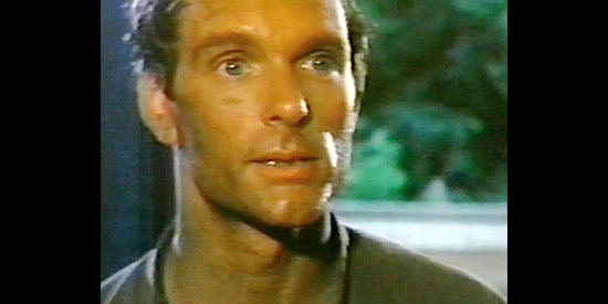 Keir Dullea as Michael Lewis, the newcomer determined to be no man's slave in Welcome to Blood City (1977)