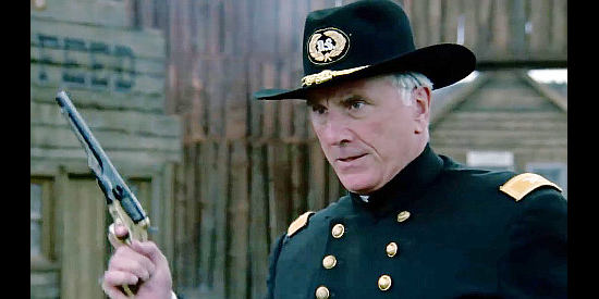 Lawrence Dane as Col. McKensie, the man who offers Britt a badge in Black Fox, Good Men and Bad (1995)