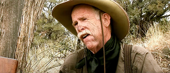 Mark Baugher as Clevis Wolf, Billy Caulder's cautious sidekick in Bannock (2014)