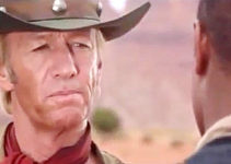 Paul Hogan as Jake Kane, providing Ben Doyle with a lesson in the art of being an outlaw in Lightning Jack (1994)