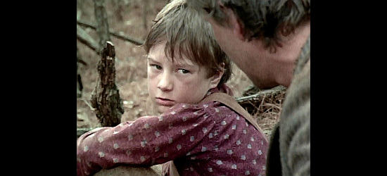 Adam Faraizi as Joe Boot, telling stepdad July Johnson the truth about his mother in Lonesome Dove (1989)