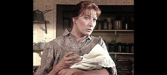 Angelica Huston as Clara Allen, opening her home to July Johnson and his infant son in Lonesome Dove (1989)
