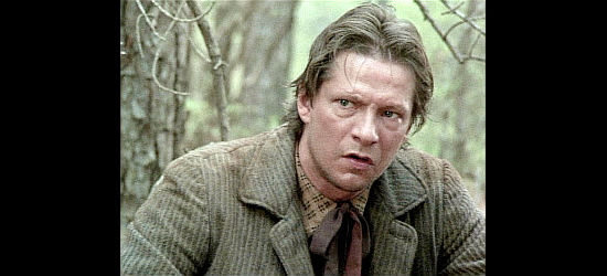 Chris Cooper as July Johnson, the Fort Smith sheriff who finds himself searching for a criminal, then his wife in Lonesome Dove (1989)