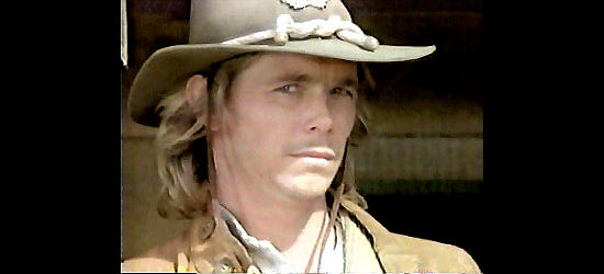 Christopher Atkins as Dusty Fog, coming to the defense of a pretty rancher named Freida LaSalle in Trigger Fast (1994)