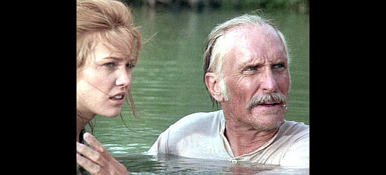 Diane Lane as Lorena Woods and Robert Duvall as Augustus McCrae have a swim interrupted in Lonesome Dove (1989)