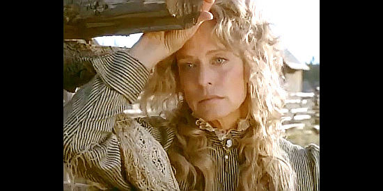 Farrah Fawcett as Nora Maxwell, a woman unsuited for the frontier in Children of the Dust (1995)