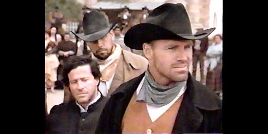 Howie Long as Reager, searching for the cowboy who killed in son in Dollar for the Dead (1999)