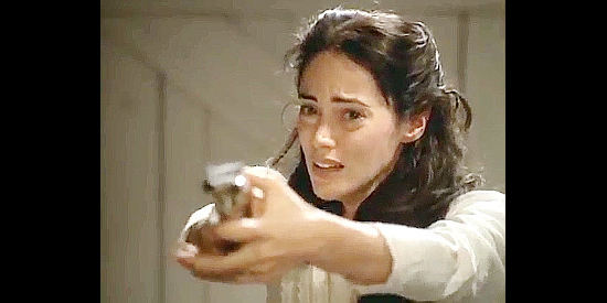 Joanna Going as Rachel Maxwell, defending her childhood friend, Corby White, in Children of the Dust (1995)