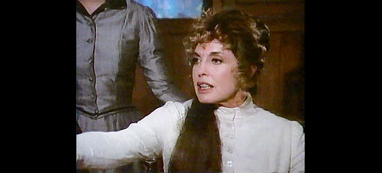 Linda Gray as Laredo Simmons, the saloon girl who rallies to the Ponderosa's defense in Bonanza, The Return (1993)