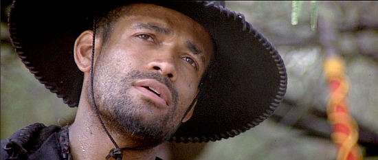 Mario Van Peebles as Jesse Lee, a man with gold and vengeance on his mind in Posse (1993)