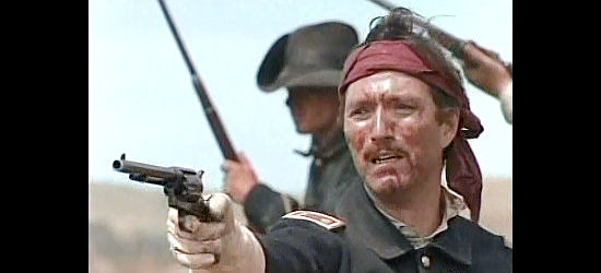 Michael Medeiros as Maj. Reno, firing at attacking Indians in Son of the Morning Star (1991)