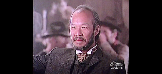 Michael Paul Chan as Hong King, in a high-stakes poker game with Charlie Bemis in Thousand Pieces of Gold (1991)