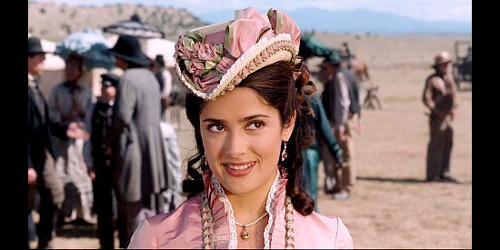 Salma Hayek as Rita Escobar makes a confession to her two admirers in WIld Wild West (1999)