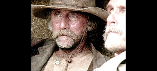 Timothy Scott as Pea Eye Park, pinned down by Indians with Augustus McCrae (Robert Duvall) in Lonesome Dove (1989)