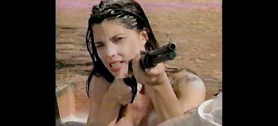 Walker Brandt as Freida LaSalle has her bath interrupted by strangers in Trigger Fast (1994)