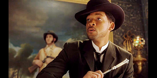Will Smith as James West, ready with a knife when his snooping is interrupted in Wild Wild West (1999)