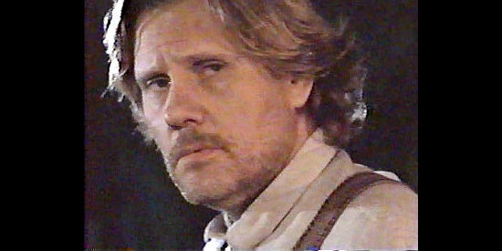 William Forsythe as Dooley, the Confederate veteran who recruits the cowboy to help search for the gold in Dollar for the Dead (1999)