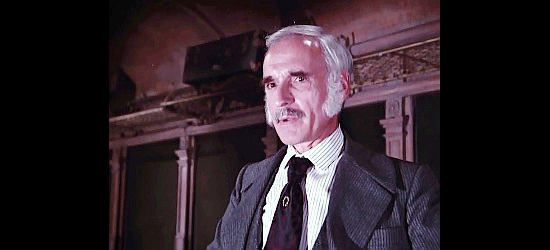 Harold Gould as Arthur Stobridge, rich owner of the railroad Brady, Jennie and Billy ride in The Gambler (1980)
