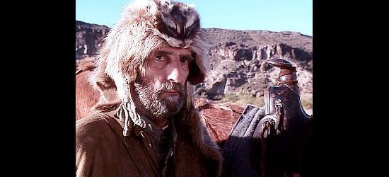 Harry Dean Stanton as Shadrach, frowning on the scalp-hunting trade in Dead Man's Walk (1996)