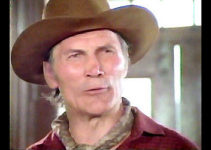 Jack Palance as Ethan Rourke, with a pretend bank deposit in The Godchild (1974)