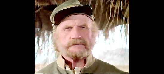 Jack Warden as Sgt. Dobbs, preparing to track down escaped prisoners in The Godchild (1974)