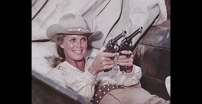 Linda Evans as Kate Muldoon, springing a surprise in The Gambler -- The Adventure Continues (1983)