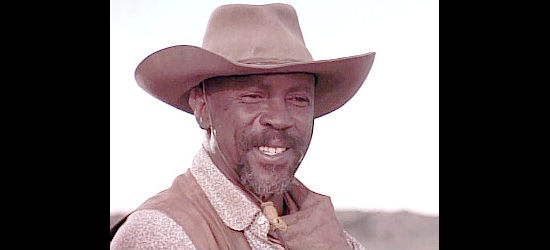 Louis Gossett Jr. as Isom Pickett, the old friend Call calls on to help drive mustangs to Montana in Return to Lonesome Dove (1993)