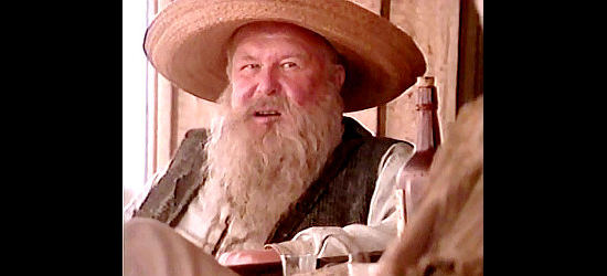Ned Beatty as Judge Roy Bean, explaining how he became a judge in Streets of Laredo (1995)