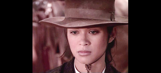 Nia Peeples as Agostina Vega, having gunned down Augustus McCrae's grave marker in Return to Lonesome Dove (1993)