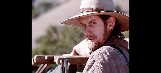 Ray McKinnon as Long Bill Coleman, wary of another scrap with the Comanche in Dead Man's Walk (1996)
