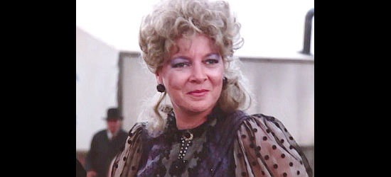 Sandy Martin as Mrs. Dickey, madam for the whores in The Gambler -- The Legend Continues (1987)