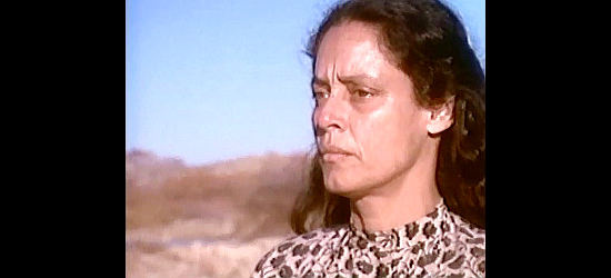 Sonia Braga as Maria Garza, a woman with one son in danger and two in need of protection in Streets of Laredo (1995)