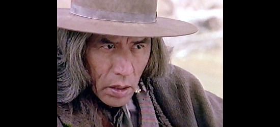 Wes Studi as Famous Shoes, the aging Indian guide hired to help track down Joey Garza in Streets of Laredo (1995)