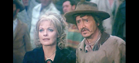 Angelica Ott as saloon girl Betty Taylor and Hans Terofal as town drunk Stumpy, concerned about Jimmy's fate in The Cry of the Black Wolves (1972)