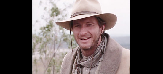 Brett Cullin as The Sundance Kid, contemplating a train station holdup in The Gamber V, Playing for Keeps (1994)