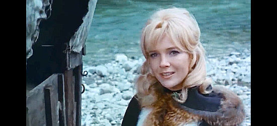 Gila von Weitershausen as Frona Williams, wondering about a persistent stranger in The Cry of the Black Wolves (1972)