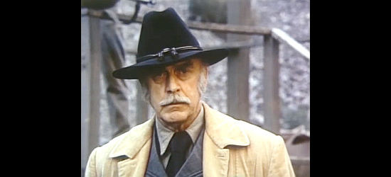John Dehner as Warden Mannering, the man ordered to hang Joshua in The New Daughters of Joshua Cabe (1976)