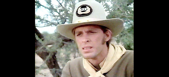 Keith Carradine as Lt. Lewis, the Confederate commander unimpressed with Texas in The Godchild (1974)