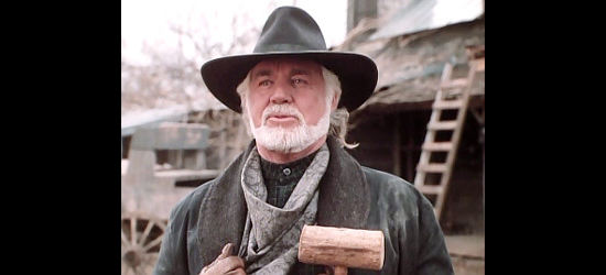 Kenny Rogers as Brady Hawkes, dreaming of a quiet life on a blossoming ranch in The Gamber V, Playing for Keeps (1994)