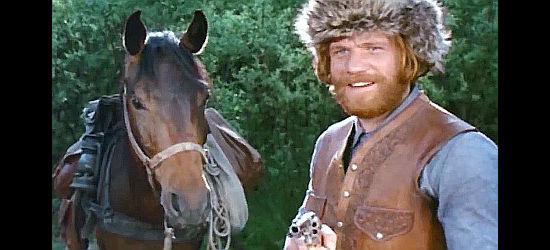 Raimund Harmstorf as Jack Harper, borrowing another man's horse the easy way in The Cry of the Black Wolves (1972)