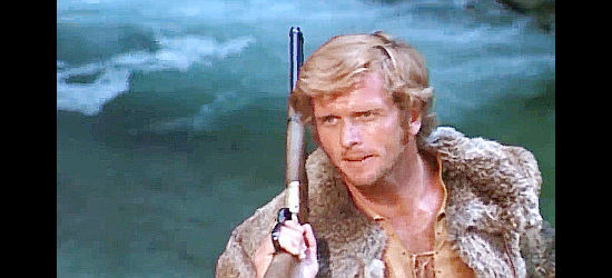 Ron Ely as Bill Robbins, determined to go on alone as he tries to save Jimmy's life in The Cry of the Black Wolves (1972)