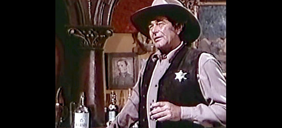 Stuart Whitman as Deputy Shreeve, about to kick the girls out of Yuma in Go West Young Girl (1978)