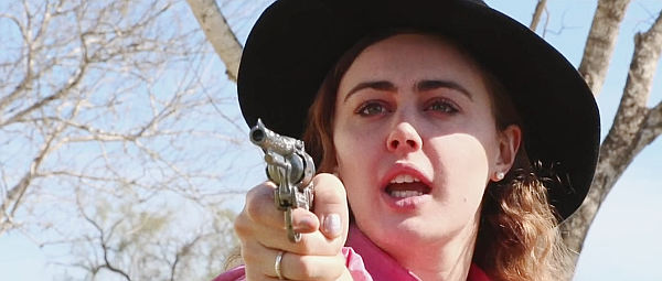 Carmen Veinhage as Bunny Parker, the former gunslinger turned drunk in Cowgirls vs. Pterodactyls (2021)