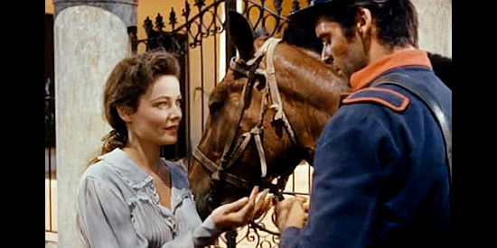 Gene Tierney as Teresa Chavez offering Martin Penalosa her necklace as a good luck charm in Way of a Gaucho (1952)