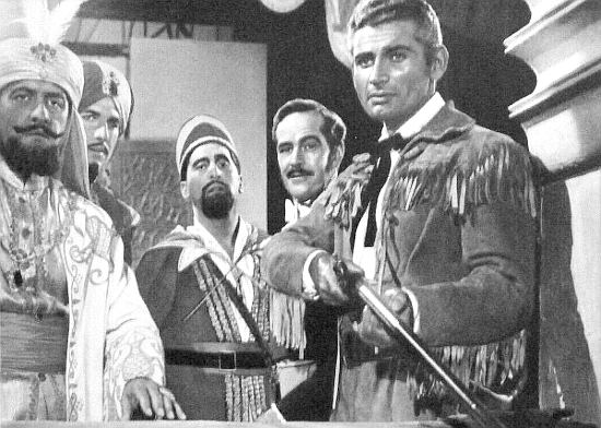 Jeff Chandler as Jason Starbuck shows off his markmanship to The Sultan (Lee J. Cobb, left) in Yankee Pasha (1954)