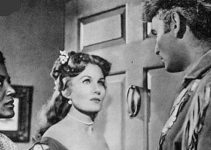 Rhonda Fleming as Roxana Reil and Jeff Chandler as Jason Starbuck in Yankee Pasha (1954)