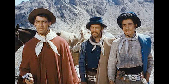 Rory Calhoun as Martin, Everett Stone as Falcon and Ronald Dumas as Julio debate the fate that should befall a captured major in Way of a Gaucho (1952)