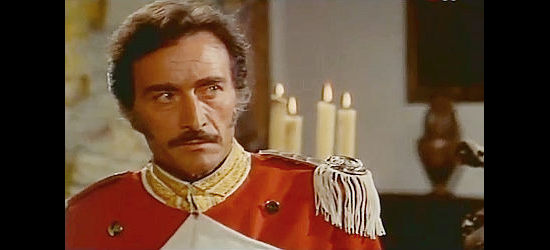 Aldo Bufi Landi as Col. Cordoba, casting a suspicious eye as Isabel questions his tax collection methods in Zorro's Latest Adventure (1969)